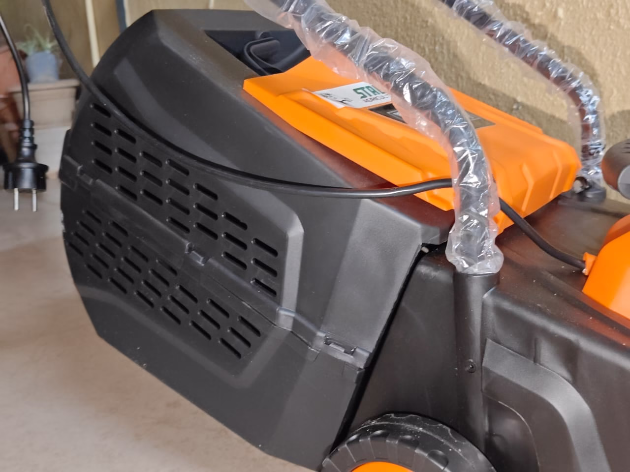 Stallion 1200 W Induction Motor Push Type 12 Inch 35L Electric Lawnmower 2 Stallion lawn mower, 1200W lawn mower, electric lawn mower, push type lawn mower, induction motor lawn mower, 12 inch lawn mower, 35L grass collector mower, electric grass cutter, garden lawn mower, home garden mower, lawn cutting machine, electric mower India, Stallion 1200W lawn mower, compact electric mower, heavy duty electric mower